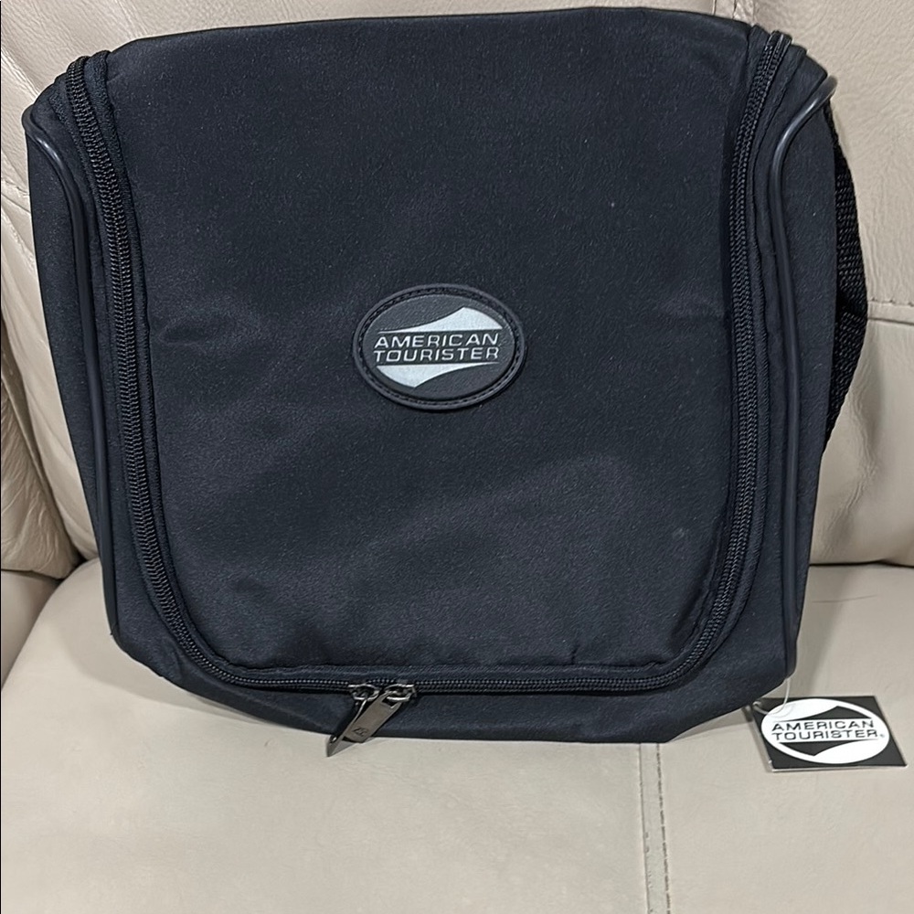 American Tourister Black Toiletry Bag with Durable Fabric and Compact Design